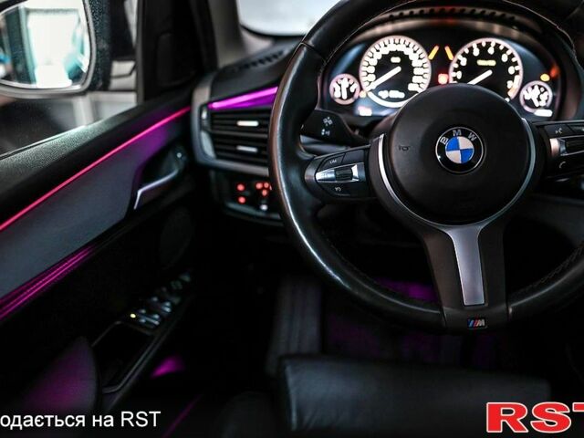 Серый БМВ Х5, объемом двигателя 2 л и пробегом 218 тыс. км за 34000 $, фото 2 на Automoto.ua