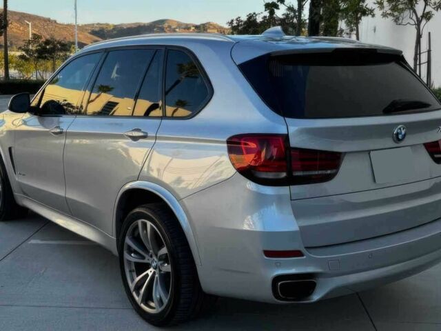 Серый БМВ Х5, объемом двигателя 4.4 л и пробегом 79 тыс. км за 9800 $, фото 6 на Automoto.ua