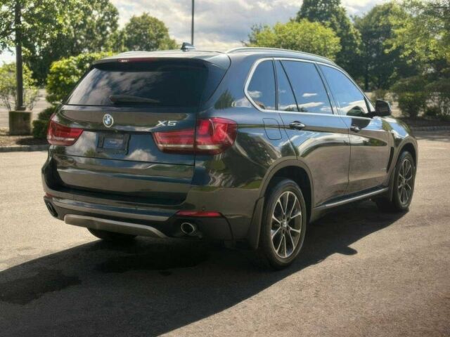 Серый БМВ Х5, объемом двигателя 3 л и пробегом 78 тыс. км за 14600 $, фото 3 на Automoto.ua
