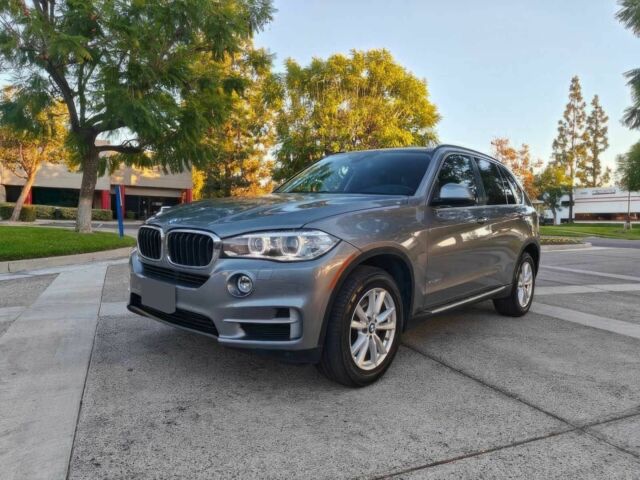 Серый БМВ Х5, объемом двигателя 3 л и пробегом 77 тыс. км за 14600 $, фото 2 на Automoto.ua