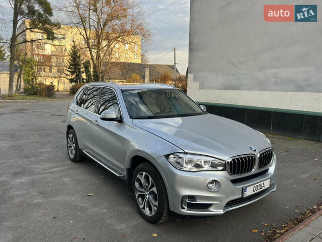 Серый БМВ Х5, объемом двигателя 2 л и пробегом 85 тыс. км за 29500 $, фото 4 на Automoto.ua