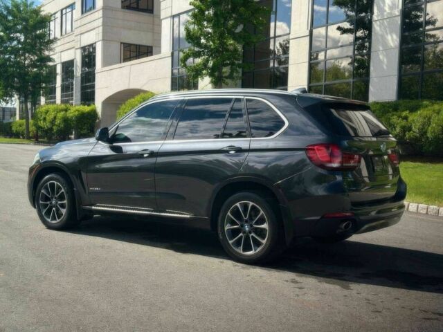 Серый БМВ Х5, объемом двигателя 3 л и пробегом 78 тыс. км за 14600 $, фото 5 на Automoto.ua