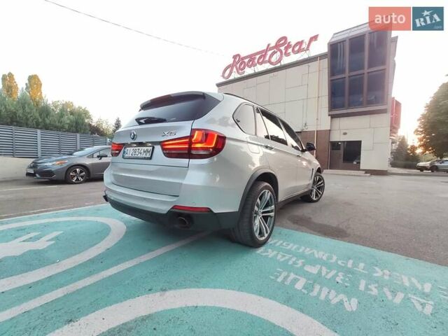 Серый БМВ Х5, объемом двигателя 3 л и пробегом 215 тыс. км за 19900 $, фото 7 на Automoto.ua