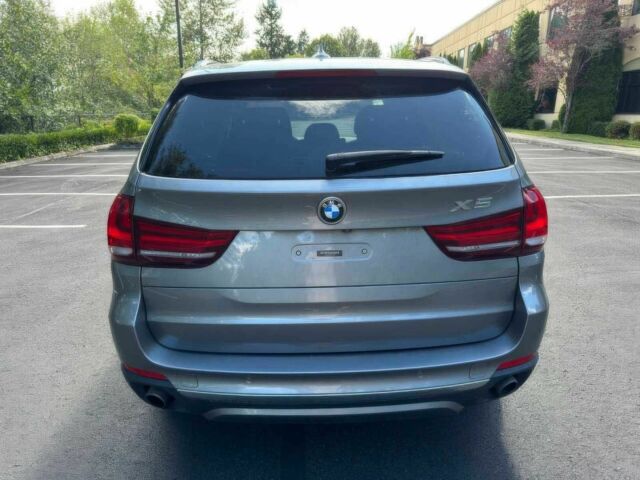 Серый БМВ Х5, объемом двигателя 3 л и пробегом 80 тыс. км за 12500 $, фото 5 на Automoto.ua