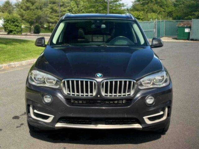 Серый БМВ Х5, объемом двигателя 3 л и пробегом 78 тыс. км за 14600 $, фото 1 на Automoto.ua