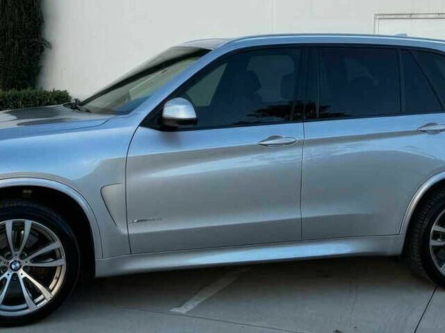 Серый БМВ Х5, объемом двигателя 4.4 л и пробегом 79 тыс. км за 9800 $, фото 3 на Automoto.ua