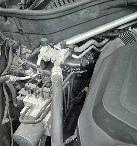 Серый БМВ Х5, объемом двигателя 3 л и пробегом 252 тыс. км за 21900 $, фото 7 на Automoto.ua