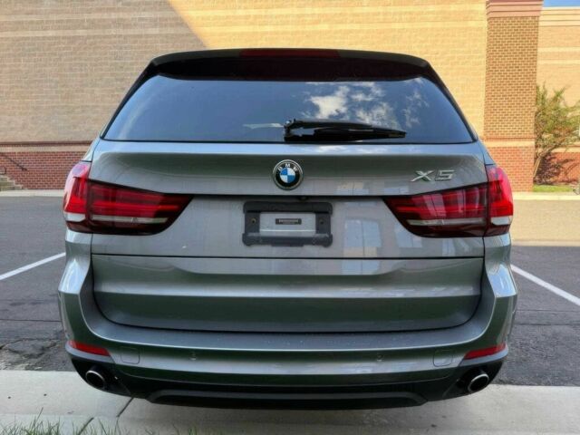 Сірий БМВ Х5, об'ємом двигуна 3 л та пробігом 75 тис. км за 19700 $, фото 3 на Automoto.ua