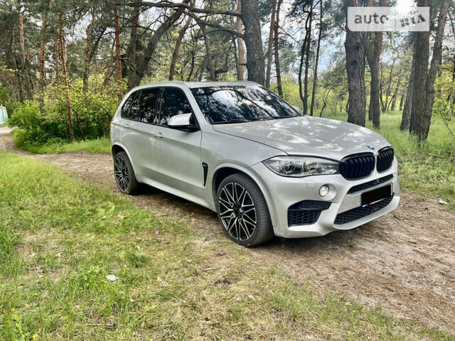 Серый БМВ Х5, объемом двигателя 3 л и пробегом 93 тыс. км за 34000 $, фото 2 на Automoto.ua