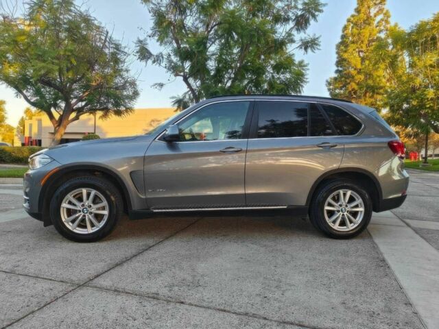 Серый БМВ Х5, объемом двигателя 3 л и пробегом 77 тыс. км за 14600 $, фото 4 на Automoto.ua