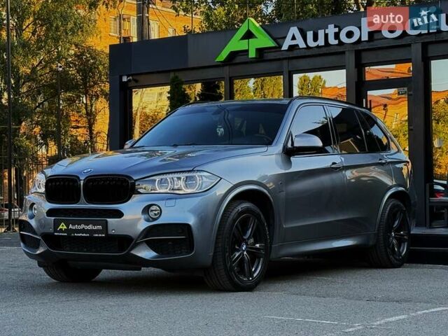 Серый БМВ Х5, объемом двигателя 3 л и пробегом 151 тыс. км за 37800 $, фото 2 на Automoto.ua