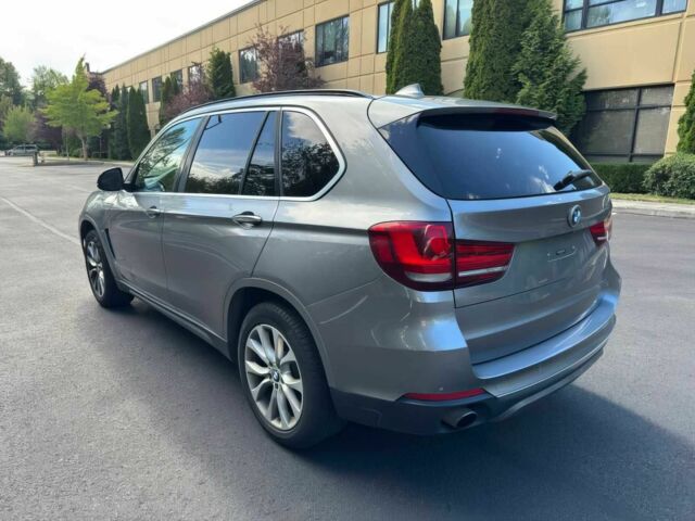 Серый БМВ Х5, объемом двигателя 3 л и пробегом 80 тыс. км за 12500 $, фото 4 на Automoto.ua