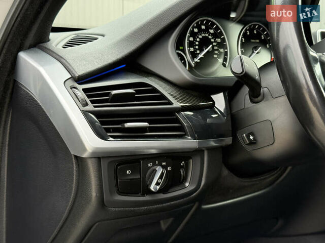 Сірий БМВ Х5, об'ємом двигуна 2 л та пробігом 218 тис. км за 25000 $, фото 13 на Automoto.ua