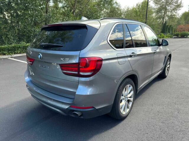 Серый БМВ Х5, объемом двигателя 3 л и пробегом 80 тыс. км за 12500 $, фото 6 на Automoto.ua