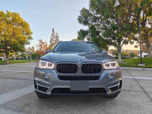 Серый БМВ Х5, объемом двигателя 3 л и пробегом 77 тыс. км за 14600 $, фото 1 на Automoto.ua