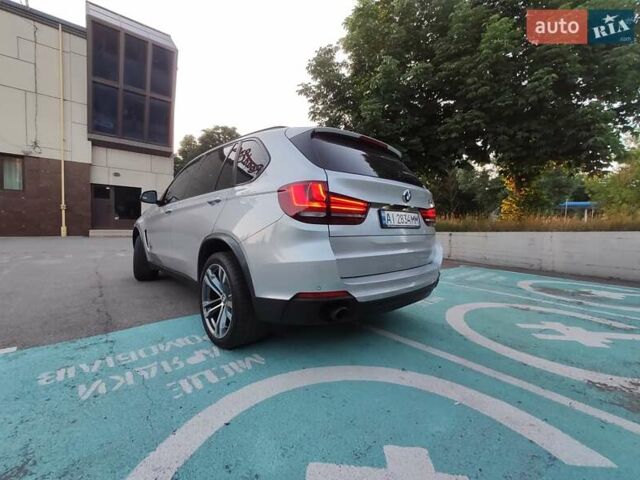 Серый БМВ Х5, объемом двигателя 3 л и пробегом 215 тыс. км за 19900 $, фото 6 на Automoto.ua