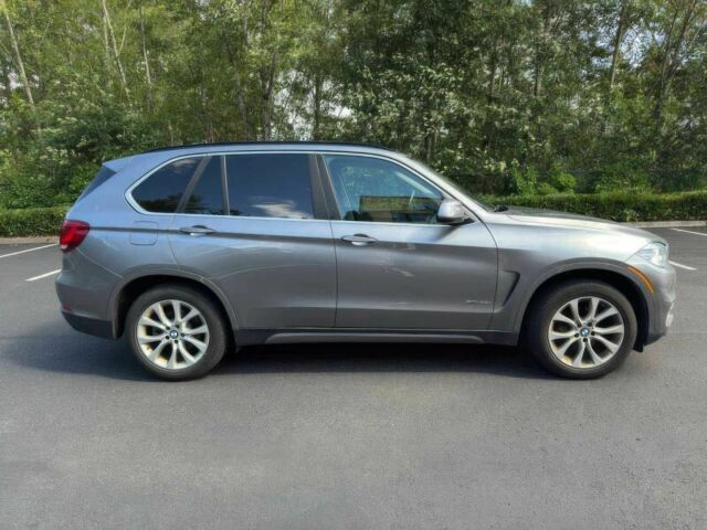 Серый БМВ Х5, объемом двигателя 3 л и пробегом 80 тыс. км за 12500 $, фото 7 на Automoto.ua