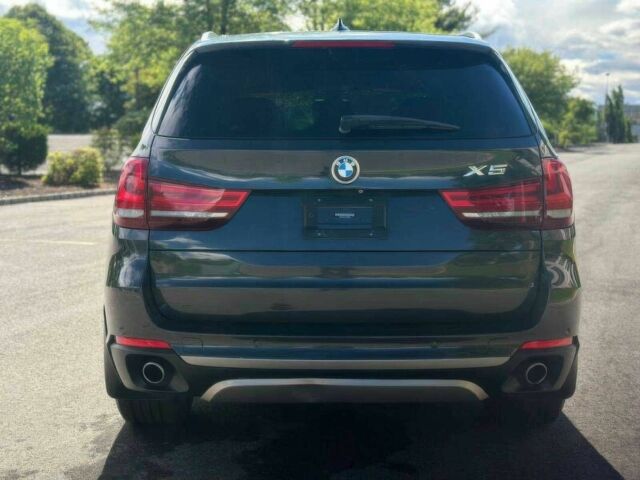 Серый БМВ Х5, объемом двигателя 3 л и пробегом 78 тыс. км за 14600 $, фото 4 на Automoto.ua