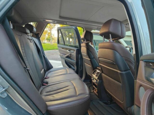 Серый БМВ Х5, объемом двигателя 3 л и пробегом 77 тыс. км за 14600 $, фото 10 на Automoto.ua