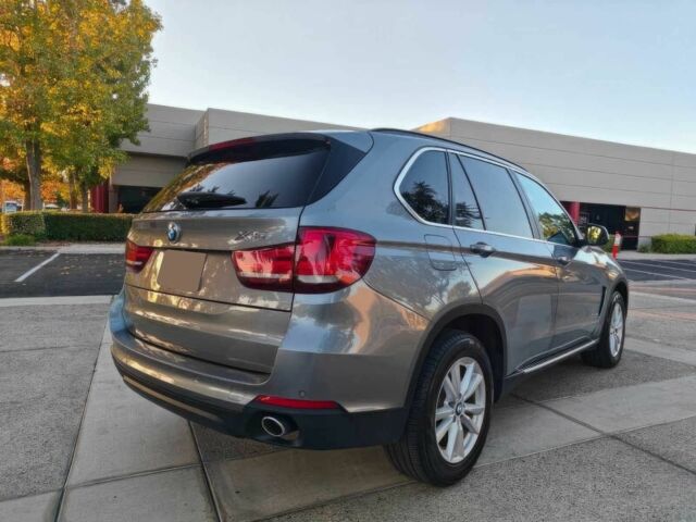 Серый БМВ Х5, объемом двигателя 3 л и пробегом 77 тыс. км за 14600 $, фото 5 на Automoto.ua