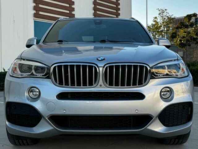 Серый БМВ Х5, объемом двигателя 4.4 л и пробегом 79 тыс. км за 9800 $, фото 1 на Automoto.ua