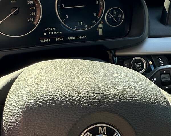 Серый БМВ Х5, объемом двигателя 2 л и пробегом 165 тыс. км за 27500 $, фото 16 на Automoto.ua