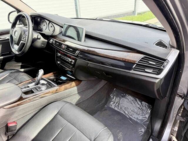 Серый БМВ Х5, объемом двигателя 3 л и пробегом 73 тыс. км за 6800 $, фото 7 на Automoto.ua