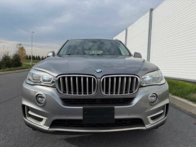 Серый БМВ Х5, объемом двигателя 3 л и пробегом 73 тыс. км за 6800 $, фото 1 на Automoto.ua