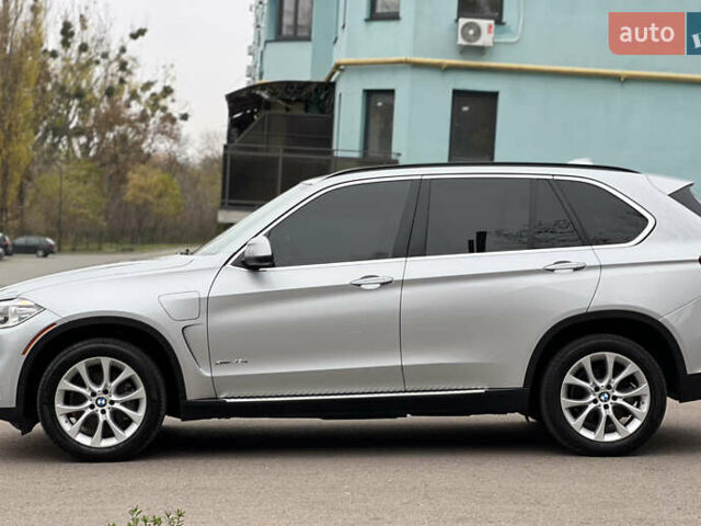 Серый БМВ Х5, объемом двигателя 2 л и пробегом 246 тыс. км за 18850 $, фото 3 на Automoto.ua