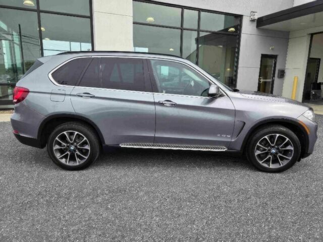 Серый БМВ Х5, объемом двигателя 3 л и пробегом 72 тыс. км за 19700 $, фото 3 на Automoto.ua
