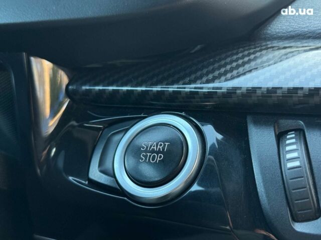 Серый БМВ Х5, объемом двигателя 2 л и пробегом 137 тыс. км за 36990 $, фото 40 на Automoto.ua