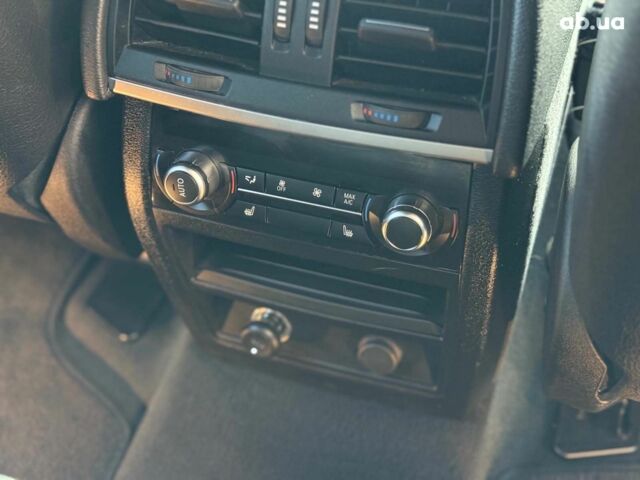 Серый БМВ Х5, объемом двигателя 2 л и пробегом 137 тыс. км за 36990 $, фото 17 на Automoto.ua