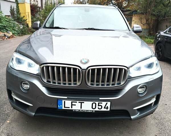 Серый БМВ Х5, объемом двигателя 2 л и пробегом 175 тыс. км за 19700 $, фото 3 на Automoto.ua