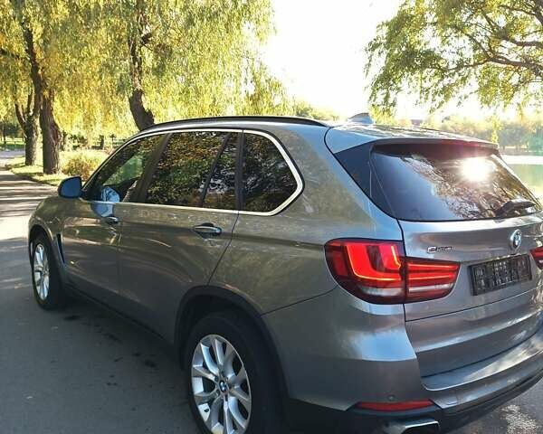 Серый БМВ Х5, объемом двигателя 2 л и пробегом 177 тыс. км за 19900 $, фото 2 на Automoto.ua
