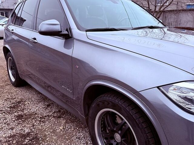 Серый БМВ Х5, объемом двигателя 3 л и пробегом 163 тыс. км за 41000 $, фото 1 на Automoto.ua