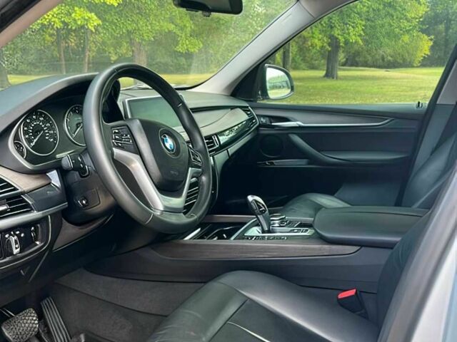 Серый БМВ Х5, объемом двигателя 3 л и пробегом 75 тыс. км за 21500 $, фото 6 на Automoto.ua