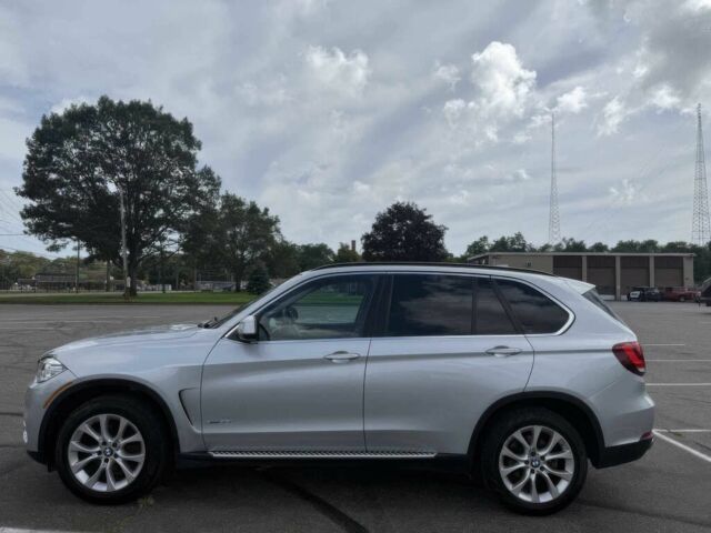 Серый БМВ Х5, объемом двигателя 3 л и пробегом 79 тыс. км за 22600 $, фото 3 на Automoto.ua