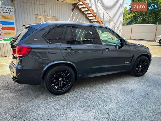 Сірий БМВ Х5, об'ємом двигуна 2 л та пробігом 210 тис. км за 29000 $, фото 2 на Automoto.ua