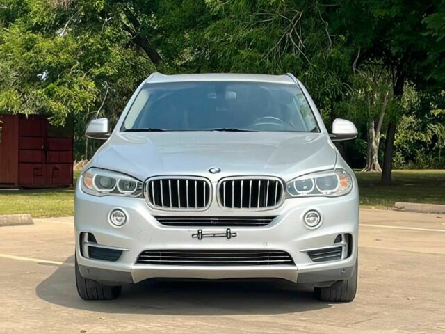 Серый БМВ Х5, объемом двигателя 3 л и пробегом 75 тыс. км за 21500 $, фото 1 на Automoto.ua