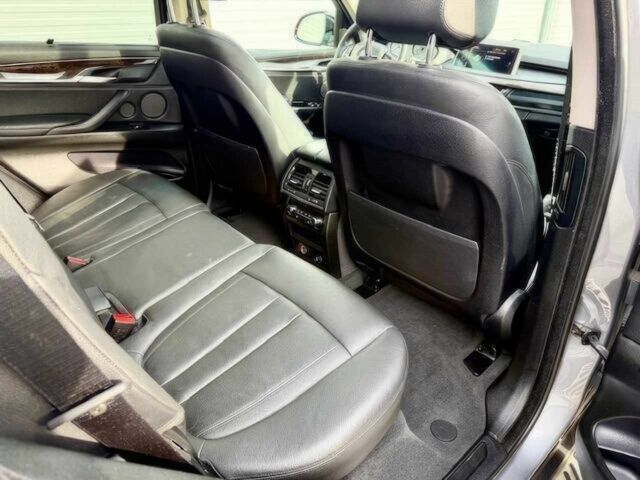 Серый БМВ Х5, объемом двигателя 3 л и пробегом 73 тыс. км за 6800 $, фото 11 на Automoto.ua