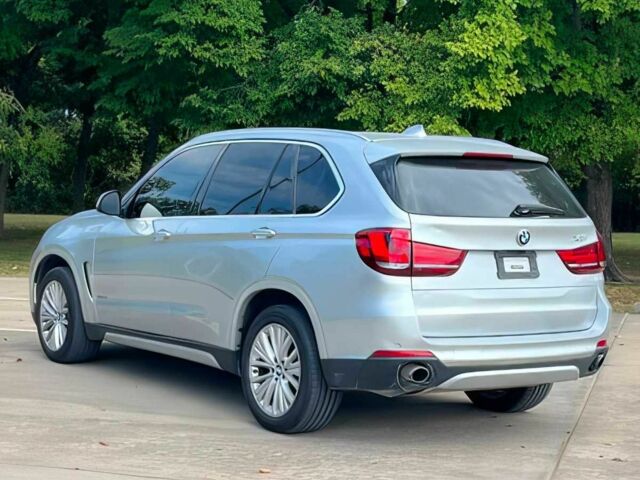 Серый БМВ Х5, объемом двигателя 3 л и пробегом 75 тыс. км за 21500 $, фото 5 на Automoto.ua
