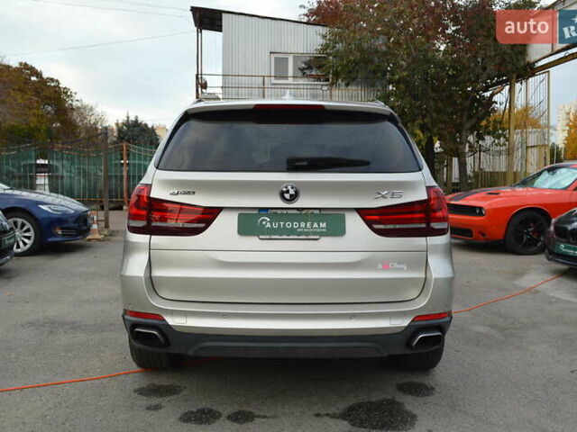 Серый БМВ Х5, объемом двигателя 2 л и пробегом 131 тыс. км за 27800 $, фото 6 на Automoto.ua