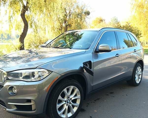 Серый БМВ Х5, объемом двигателя 2 л и пробегом 177 тыс. км за 19900 $, фото 1 на Automoto.ua