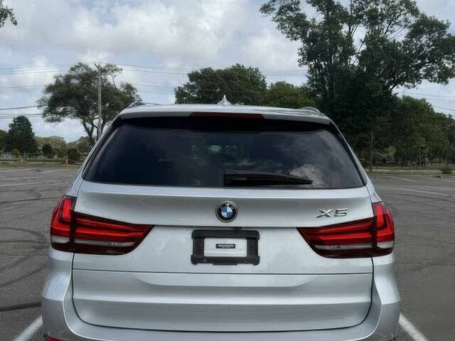 Сірий БМВ Х5, об'ємом двигуна 3 л та пробігом 72 тис. км за 11000 $, фото 4 на Automoto.ua