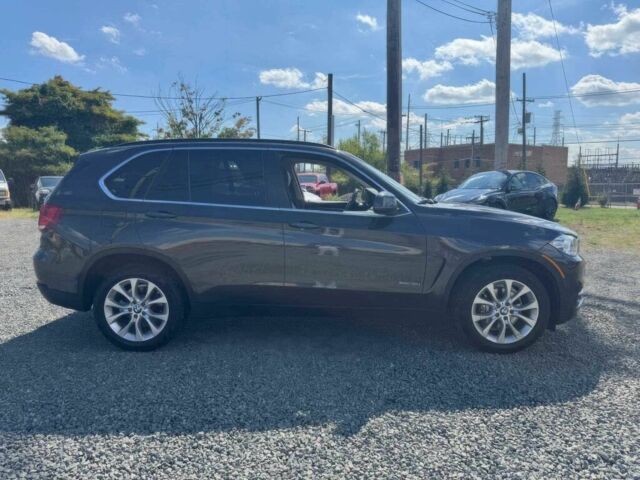 Серый БМВ Х5, объемом двигателя 3 л и пробегом 70 тыс. км за 17000 $, фото 7 на Automoto.ua