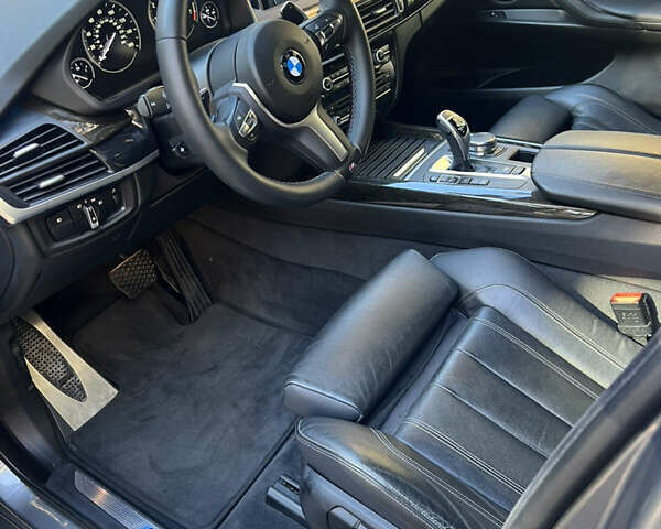 Серый БМВ Х5, объемом двигателя 2.98 л и пробегом 94 тыс. км за 29900 $, фото 2 на Automoto.ua