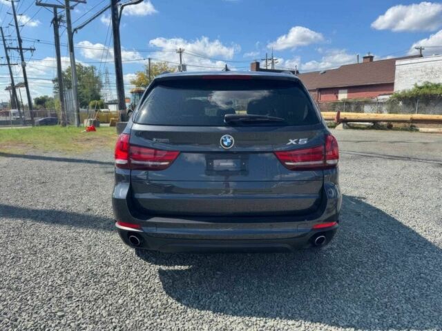 Серый БМВ Х5, объемом двигателя 3 л и пробегом 70 тыс. км за 17000 $, фото 5 на Automoto.ua