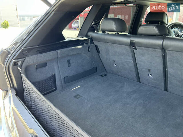 Сірий БМВ Х5, об'ємом двигуна 2 л та пробігом 136 тис. км за 31000 $, фото 10 на Automoto.ua