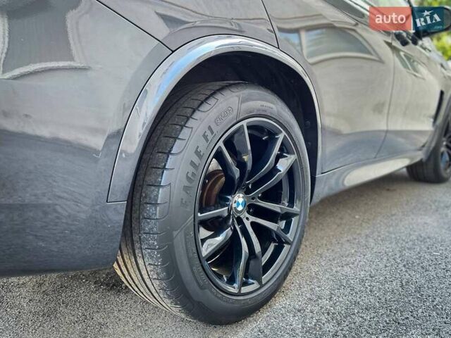 Сірий БМВ Х5, об'ємом двигуна 2 л та пробігом 210 тис. км за 29000 $, фото 4 на Automoto.ua