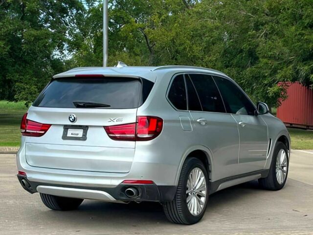 Серый БМВ Х5, объемом двигателя 3 л и пробегом 75 тыс. км за 21500 $, фото 3 на Automoto.ua
